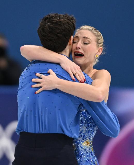 (260212) -- MILAN, Feb. 12, 2026 (Xinhua) -- Piper Gilles and Paul Poirier of Canada react during the free dance competition of figure skating ice dance at the Milan-Cortina 2026 Olympic Winter Games in Milan, Italy, Feb. 11, 2026. (Xinhua/Cheng Min)