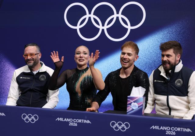 (260212) -- MILAN, Feb. 12, 2026 (Xinhua) -- Natalie Taschlerova and Filip Taschler of the Czech Repbulic as they wait for the scores during the free dance competition of figure skating ice dance at the Milan-Cortina 2026 Olympic Winter Games in Milan, Italy, Feb. 11, 2026. (Xinhua/Chen Yichen)