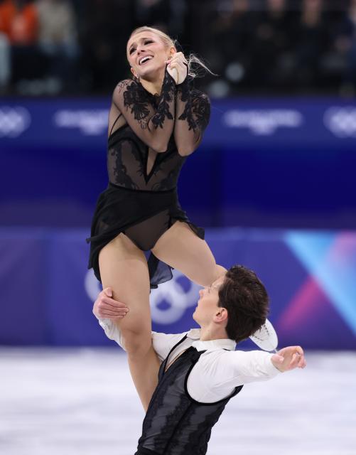 (260212) -- MILAN, Feb. 12, 2026 (Xinhua) -- Emilea Zingas and Vadym Kolesnik of the United States perform during the free dance competition of figure skating ice dance at the Milan-Cortina 2026 Olympic Winter Games in Milan, Italy, Feb. 11, 2026. (Xinhua/Chen Yichen)