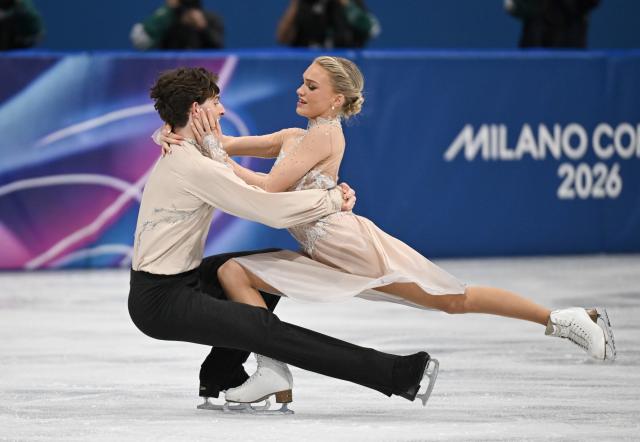 (260212) -- MILAN, Feb. 12, 2026 (Xinhua) -- Phebe Bekker and James Hernandez of Britain perform during the free dance competition of figure skating ice dance at the Milan-Cortina 2026 Olympic Winter Games in Milan, Italy, Feb. 11, 2026. (Xinhua/Cheng Min)