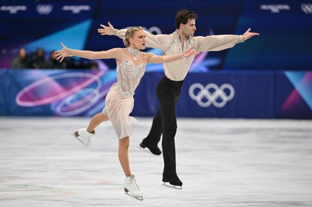 (260212) -- MILAN, Feb. 12, 2026 (Xinhua) -- Phebe Bekker and James Hernandez of Britain perform during the free dance competition of figure skating ice dance at the Milan-Cortina 2026 Olympic Winter Games in Milan, Italy, Feb. 11, 2026. (Xinhua/Cheng Min)