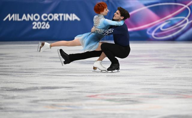 (260212) -- MILAN, Feb. 12, 2026 (Xinhua) -- Evgeniia Lopareva and Geoffrey Brissaud of France perform during the free dance competition of figure skating ice dance at the Milan-Cortina 2026 Olympic Winter Games in Milan, Italy, Feb. 11, 2026. (Xinhua/Cheng Min)