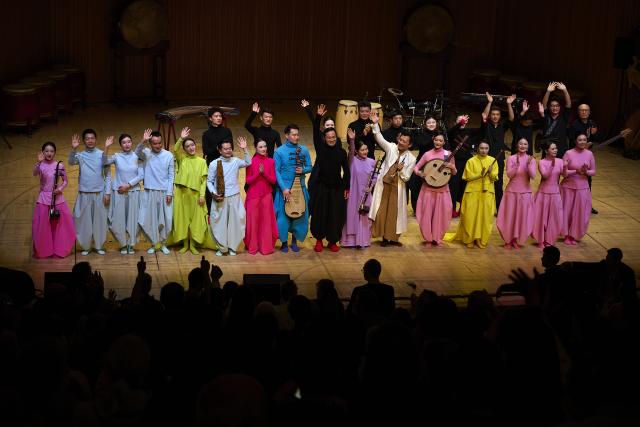 (260212) -- VALENCIA, Feb. 12, 2026 (Xinhua) -- Members of the Shanghai Chinese Orchestra greet the audience after the "Colors of China" concert in Valencia, Spain, Feb. 10, 2026. (Photo by Pablo Morano/Xinhua)