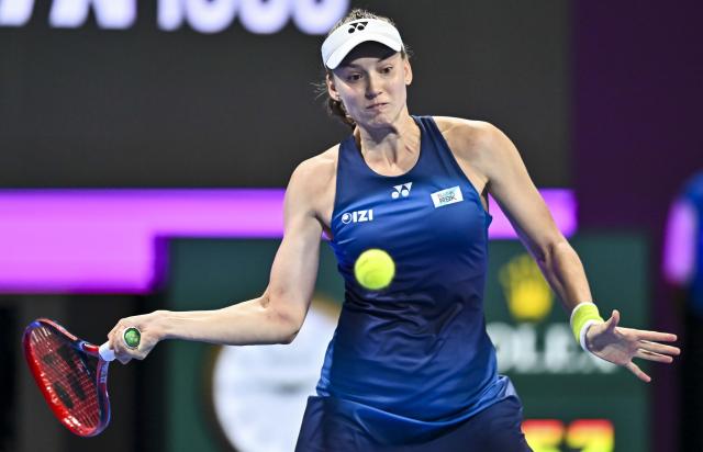 (260212) -- DOHA, Feb. 12, 2026 (Xinhua) -- Elena Rybakina of Kazakhstan hits a return during the women's singles round of 16 match between Zheng Qinwen of China and Elena Rybakina of Kazakhstan at the WTA Qatar Open 2026 tennis tournament in Doha, Qatar, Feb. 11, 2026. (Photo by Nikku/Xinhua)