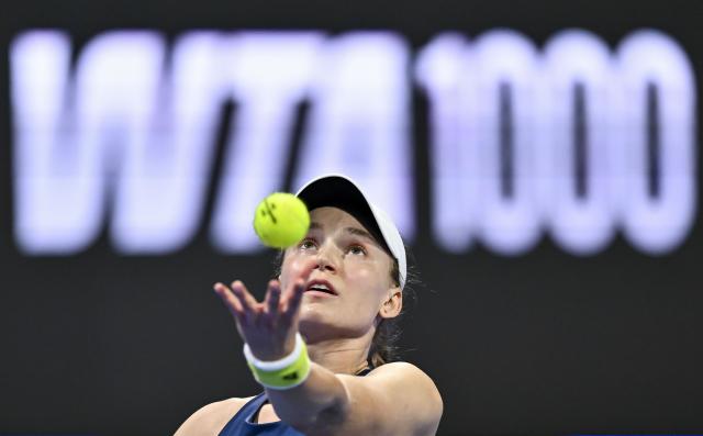 (260212) -- DOHA, Feb. 12, 2026 (Xinhua) -- Elena Rybakina of Kazakhstan serves during the women's singles round of 16 match between Zheng Qinwen of China and Elena Rybakina of Kazakhstan at the WTA Qatar Open 2026 tennis tournament in Doha, Qatar, Feb. 11, 2026. (Photo by Nikku/Xinhua)