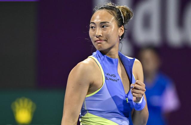 (260212) -- DOHA, Feb. 12, 2026 (Xinhua) -- Zheng Qinwen of China reacts during the women's singles round of 16 match between Zheng Qinwen of China and Elena Rybakina of Kazakhstan at the WTA Qatar Open 2026 tennis tournament in Doha, Qatar, Feb. 11, 2026. (Photo by Nikku/Xinhua)