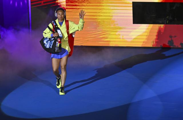 (260212) -- DOHA, Feb. 12, 2026 (Xinhua) -- Zheng Qinwen of China walks onto the court before the women's singles round of 16 match between Zheng Qinwen of China and Elena Rybakina of Kazakhstan at the WTA Qatar Open 2026 tennis tournament in Doha, Qatar, Feb. 11, 2026. (Photo by Nikku/Xinhua)
