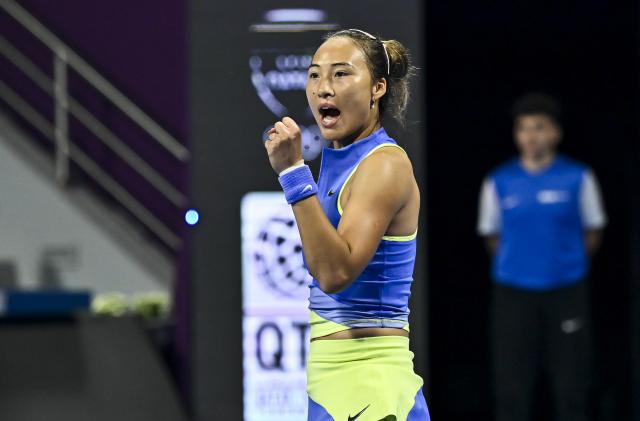 (260212) -- DOHA, Feb. 12, 2026 (Xinhua) -- Zheng Qinwen of China reacts during the women's singles round of 16 match between Zheng Qinwen of China and Elena Rybakina of Kazakhstan at the WTA Qatar Open 2026 tennis tournament in Doha, Qatar, Feb. 11, 2026. (Photo by Nikku/Xinhua)