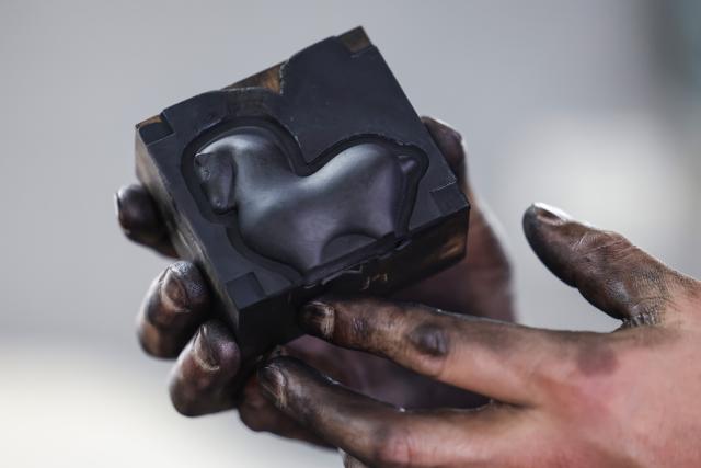 (260212) -- HUANGSHAN, Feb. 12, 2026 (Xinhua) -- A crafter makes a Hui ink stick inspired by the Chinese zodiac Year of the Horse at an ink workshop in Shexian County, east China's Anhui Province, Feb. 11, 2026.
  Delicate Hui ink sticks inspired by the Chinese zodiac Year of the Horse delight the eyes, making the millennium-old ink-making craftsmanship shine again.
  Hui ink sticks are mainly crafted in east China's Anhui Province, hence earning the moniker "Hui" ink, as the region was originally under the jurisdiction of Huizhou in ancient China. (Photo by Shi Yalei/Xinhua)