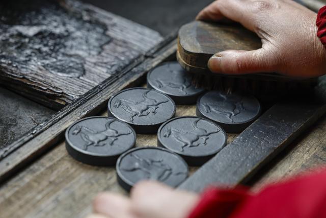 (260212) -- HUANGSHAN, Feb. 12, 2026 (Xinhua) -- A crafter makes Hui ink sticks inspired by the Chinese zodiac Year of the Horse at an ink workshop in Shexian County, east China's Anhui Province, Feb. 11, 2026.
  Delicate Hui ink sticks inspired by the Chinese zodiac Year of the Horse delight the eyes, making the millennium-old ink-making craftsmanship shine again.
  Hui ink sticks are mainly crafted in east China's Anhui Province, hence earning the moniker "Hui" ink, as the region was originally under the jurisdiction of Huizhou in ancient China. (Photo by Shi Yalei/Xinhua)