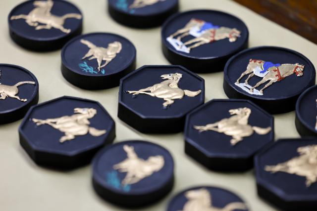 (260212) -- HUANGSHAN, Feb. 12, 2026 (Xinhua) -- This photo shows Hui ink sticks inspired by the Chinese zodiac Year of the Horse at an ink workshop in Shexian County, east China's Anhui Province, Feb. 11, 2026.
  Delicate Hui ink sticks inspired by the Chinese zodiac Year of the Horse delight the eyes, making the millennium-old ink-making craftsmanship shine again.
  Hui ink sticks are mainly crafted in east China's Anhui Province, hence earning the moniker "Hui" ink, as the region was originally under the jurisdiction of Huizhou in ancient China. (Photo by Shi Yalei/Xinhua)