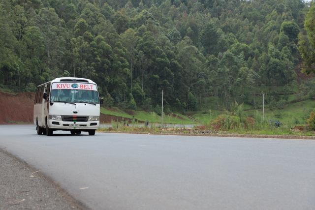 (260212) -- KIGALI, Feb. 12, 2026 (Xinhua) -- This photo taken on Feb. 9, 2026 shows a vehicle on the Nyange-Muhanga road constructed by China's Stecol Corporation in Rwanda's Southern Province.
  TO GO WITH "Feature: Chinese-built Nyange-Muhanga road improves transport, trade in southern Rwanda" (Xinhua/Ju Yinhe)
