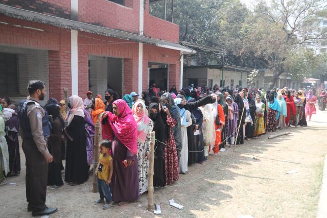 (260212) -- DHAKA, Feb. 12, 2026 (Xinhua) -- Voters wait in line to cast their ballots in the National Parliament election and a public referendum in Dhaka, Bangladesh, Feb. 12, 2026.
  Voting began across Bangladesh on Thursday morning in the country's national parliament election, with more than 127 million registered voters expected to cast their ballots.
   The voting started at 7:30 a.m. local time at over 42,000 polling centers nationwide and will be closed at 4:30 p.m. local time. (Photo by Habibur Rahman/Xinhua)