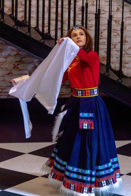 (260212) -- BAKU, Feb. 12, 2026 (Xinhua) -- A student from the Confucius Institute at Azerbaijan University of Languages performs Chinese folk dance during a Chinese New Year cultural event at Baku Book Center in Baku, Azerbaijan, Feb. 11, 2026. The Confucius Institute at Azerbaijan University of Languages hosted a Chinese New Year cultural event here on Wednesday. Over 80 local audience joined students from the institute as well as representatives of Chinese-funded enterprises to enjoy performances including classical Chinese poetry recitations, classic Chinese songs, Chinese folk-style dances, and Peking Opera excerpts. (Xinhua/Chen Junfeng)