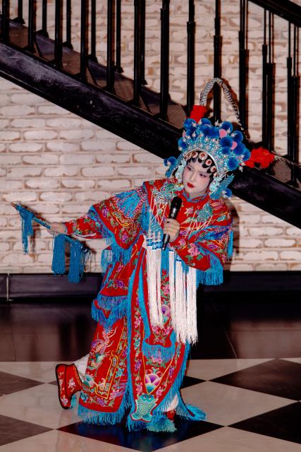 (260212) -- BAKU, Feb. 12, 2026 (Xinhua) -- A student from the Confucius Institute at Azerbaijan University of Languages performs Peking Opera during a Chinese New Year cultural event at Baku Book Center in Baku, Azerbaijan, Feb. 11, 2026. The Confucius Institute at Azerbaijan University of Languages hosted a Chinese New Year cultural event here on Wednesday. Over 80 local audience joined students from the institute as well as representatives of Chinese-funded enterprises to enjoy performances including classical Chinese poetry recitations, classic Chinese songs, Chinese folk-style dances, and Peking Opera excerpts. (Xinhua/Chen Junfeng)