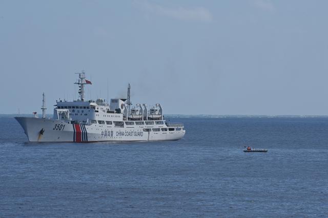 (260212) -- SOUTH CHINA SEA, Feb. 12, 2026 (Xinhua) -- The China Coast Guard (CCG) vessel Zhongsha conducts a law enforcement drill in the territorial waters of China's Huangyan Dao on Feb. 4, 2026. (Photo by Zhai Yifan/Xinhua)