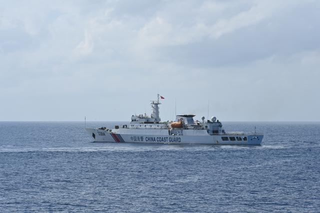 (260212) -- SOUTH CHINA SEA, Feb. 12, 2026 (Xinhua) -- The China Coast Guard (CCG) vessel Dahao patrols in the territorial waters of China's Huangyan Dao on Feb. 4, 2026. (Photo by Zhai Yifan/Xinhua)