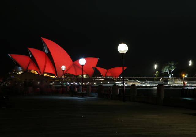 (260212) -- SYDNEY, Feb. 12, 2026 (Xinhua) -- This photo taken on Feb. 12, 2026 shows the Opera House lit up in red to celebrate the upcoming Chinese New Year in Sydney, Australia. (Xinhua/Ma Ping)