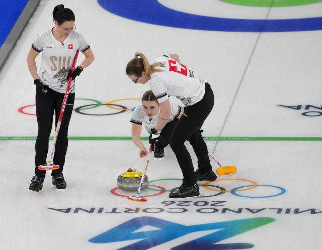 (260212) -- CORTINA D'AMPEZZO, Feb. 12, 2026 (Xinhua) -- Selina Witschonke (C) of Switzerland competes during the curling women round robin session 1 match between Italy and Switzerland at the 2026 Milan-Cortina Winter Olympics in Cortina D'Ampezzo, Italy, Feb. 12, 2026. (Xinhua/Li Gang)