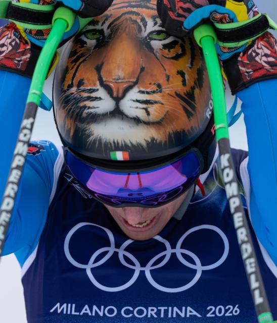 (260212) -- CORTINA D'AMPEZZO, Feb. 12, 2026 (Xinhua) -- Federica Brignone of Italy reacts after the alpine skiing women's Super-G at the 2026 Milan-Cortina Winter Olympics in Cortina D'Ampezzo, Italy, Feb. 12, 2026. (Xinhua/Fei Maohua)