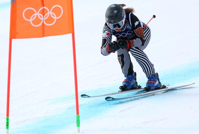 (260212) -- CORTINA D'AMPEZZO, Feb. 12, 2026 (Xinhua) -- Sarah Schleper of Mexico competes during the alpine skiing women's Super-G at the 2026 Milan-Cortina Winter Olympics in Cortina D'Ampezzo, Italy, Feb. 12, 2026. (Xinhua/Zhang Chenlin)