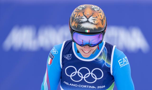 (260212) -- CORTINA D'AMPEZZO, Feb. 12, 2026 (Xinhua) -- Federica Brignone of Italy reacts after the alpine skiing women's Super-G at the 2026 Milan-Cortina Winter Olympics in Cortina D'Ampezzo, Italy, Feb. 12, 2026. (Xinhua/Fei Maohua)