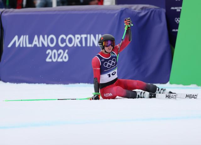 (260212) -- CORTINA D'AMPEZZO, Feb. 12, 2026 (Xinhua) -- Cornelia Huetter of Austria reacts after the alpine skiing women's Super-G at the 2026 Milan-Cortina Winter Olympics in Cortina D'Ampezzo, Italy, Feb. 12, 2026. (Xinhua/Zhang Chenlin)