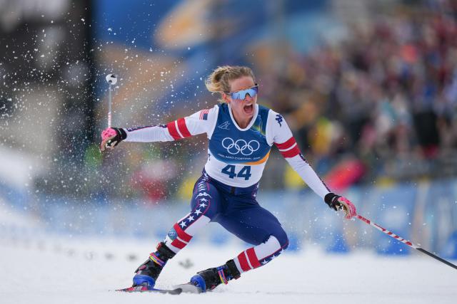 (260212) -- TESERO, Feb. 12, 2026 (Xinhua) -- Jessie Diggins of the United States crosses the finish line during the Cross-Country Skiing Women's 10km Interval Start Free at the Milano Cortina 2026 Olympic Winter Games in Tesero, Italy, Feb. 12, 2026. (Xinhua/Peng Ziyang)