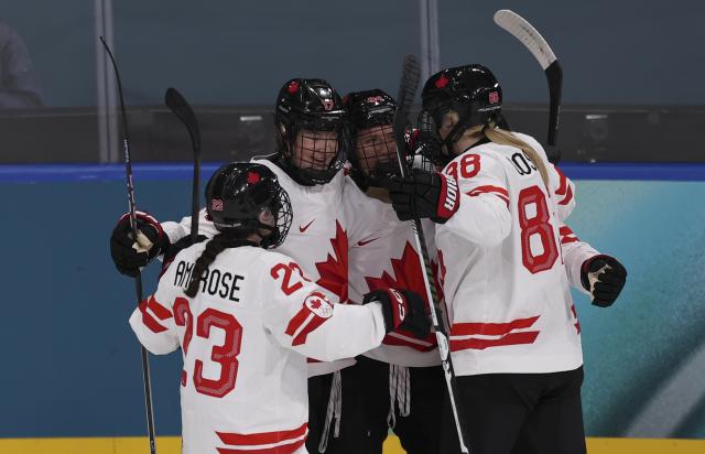 (260212) -- MILAN, Feb. 12, 2026 (Xinhua) -- Players of Canada celebrate scoring during the ice hockey women's preliminary round group A match between Finland and Canada at the Milan-Cortina 2026 Olympic Winter Games in Milan, Italy, Feb. 12, 2026. (Xinhua/Wang Kaiyan)