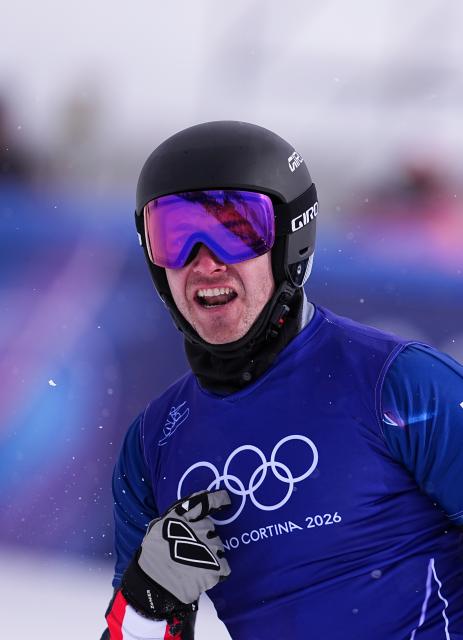 (260212) -- LIVIGNO, Feb. 12, 2026 (Xinhua) -- Alessandro Haemmerle of Austria celebrates after the snowboard men's cross final at the Milan-Cortina 2026 Olympic Winter Games in Livigno, Italy, Feb. 12, 2026. (Xinhua/Wu Huiwo)
