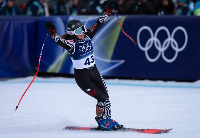 (260212) -- CORTINA D'AMPEZZO, Feb. 12, 2026 (Xinhua) -- Sarah Schleper of Mexico celebrates after the alpine skiing women's Super-G at the 2026 Milan-Cortina Winter Olympics in Cortina, Italy, Feb. 12, 2026. (Xinhua/Fei Maohua)