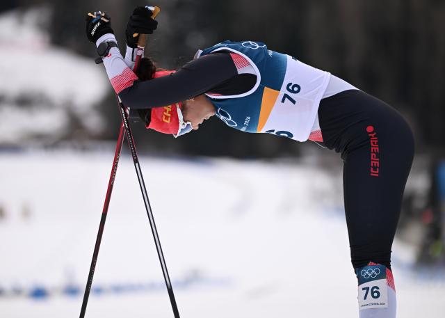 (260212) -- TESERO, Feb. 12, 2026 (Xinhua) -- Wang Yundi of China reacts after the cross-country skiing women's 10km interval start free match at the Milan-Cortina 2026 Olympic Winter Games in Tesero, Italy, Feb. 12, 2026. (Xinhua/He Canling)