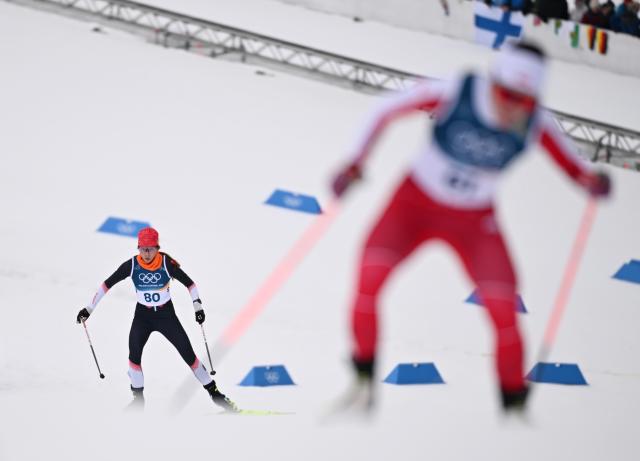 (260212) -- TESERO, Feb. 12, 2026 (Xinhua) -- He Kaile of China competes during the cross-country skiing women's 10km interval start free match at the Milan-Cortina 2026 Olympic Winter Games in Tesero, Italy, Feb. 12, 2026. (Xinhua/He Canling)