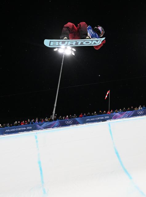 (260212) -- LIVIGNO, Feb. 12, 2026 (Xinhua) -- Cai Xuetong of China competes during the women's snowboard halfpipe final at the Milan-Cortina 2026 Olympic Winter Games in Livigno, Italy, Feb. 12, 2026. (Xinhua/Xia Yifang)