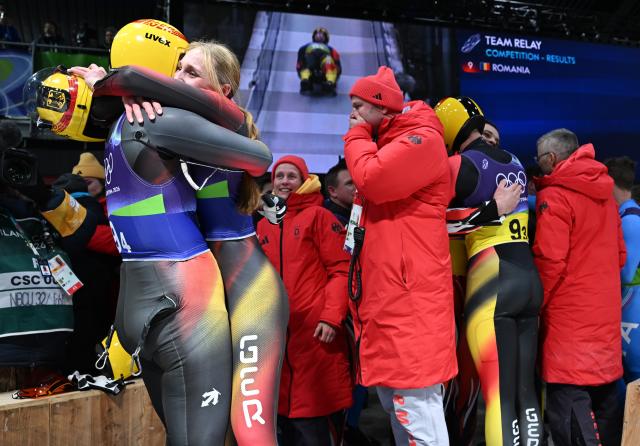 (260212) -- CORTINA D'AMPEZZO, Feb. 12, 2026 (Xinhua) -- Athletes of Germany celebrate after the luge team relay match at the Milan-Cortina 2026 Olympic Winter Games in Cortina, Italy, Feb. 12, 2026. (Xinhua/Lian Yi)