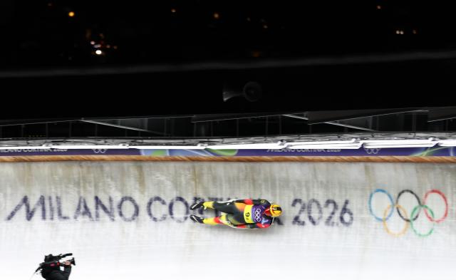 (260212) -- CORTINA D'AMPEZZO, Feb. 12, 2026 (Xinhua) -- Max Langenhan of Germany competes during the luge team relay match at the Milan-Cortina 2026 Olympic Winter Games in Cortina, Italy, Feb. 12, 2026. (Xinhua/Ding Xu)