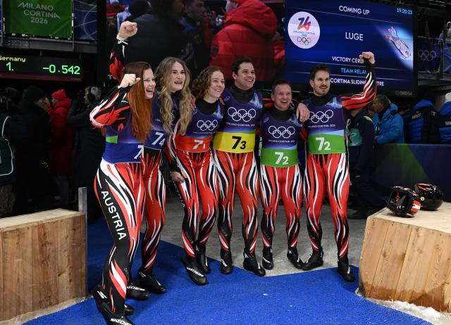 (260212) -- CORTINA D'AMPEZZO, Feb. 12, 2026 (Xinhua) -- Athletes of Austria celebrate after the luge team relay match at the Milan-Cortina 2026 Olympic Winter Games in Cortina, Italy, Feb. 12, 2026. (Xinhua/Lian Yi)