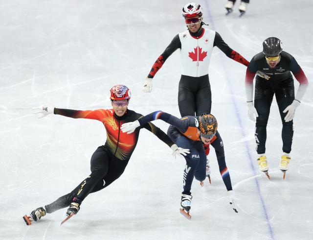 (260212) -- MILAN, Feb. 12, 2026 (Xinhua) -- Sun Long (1st L) of China competes during the short track speed skating men's 1000m final A at the Milan-Cortina 2026 Olympic Winter Games in Milan, Italy, Feb. 12, 2026. (Xinhua/Li Ming)
