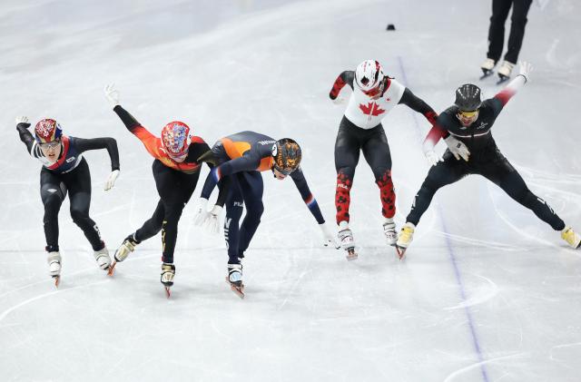 (260212) -- MILAN, Feb. 12, 2026 (Xinhua) -- Sun Long (2nd L) of China competes during the short track speed skating men's 1000m final A at the Milan-Cortina 2026 Olympic Winter Games in Milan, Italy, Feb. 12, 2026. (Xinhua/Li Ming)