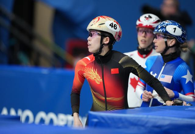 (260212) -- MILAN, Feb. 12, 2026 (Xinhua) -- Fan Kexin (L) of China reacts after the short track speed skating women's 500m final B at the Milan-Cortina 2026 Olympic Winter Games in Milan, Italy, Feb. 12, 2026. (Xinhua/Xue Yuge)