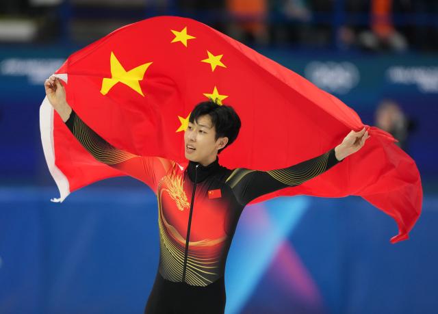 (260212) -- MILAN, Feb. 12, 2026 (Xinhua) -- Sun Long of China celebrates after the short track speed skating men's 1000m final A at the Milan-Cortina 2026 Olympic Winter Games in Milan, Italy, Feb. 12, 2026. (Xinhua/Xue Yuge)