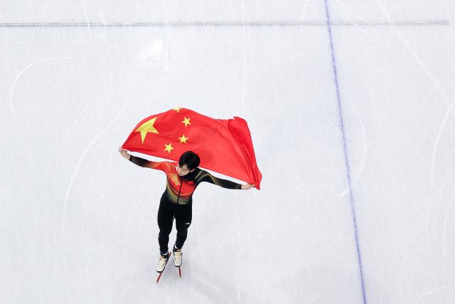 (260212) -- MILAN, Feb. 12, 2026 (Xinhua) -- Sun Long of China celebrates after the short track speed skating men's 1000m final A at the Milan-Cortina 2026 Olympic Winter Games in Milan, Italy, Feb. 12, 2026. (Xinhua/Chen Yichen)