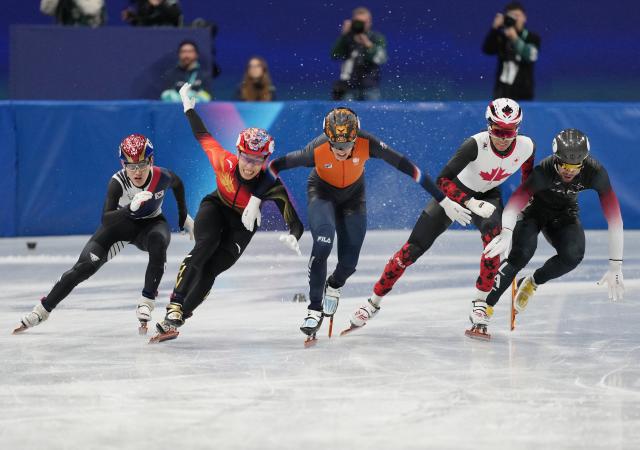(260212) -- MILAN, Feb. 12, 2026 (Xinhua) -- Sun Long (2nd L) of China competes during the short track speed skating men's 1000m final A at the Milan-Cortina 2026 Olympic Winter Games in Milan, Italy, Feb. 12, 2026. (Xinhua/Xue Yuge)