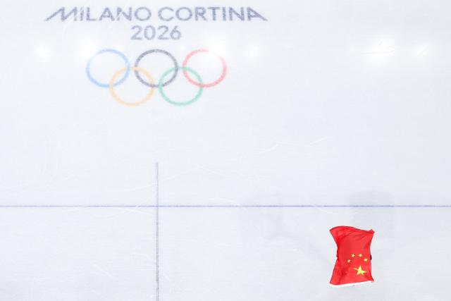 (260212) -- MILAN, Feb. 12, 2026 (Xinhua) -- Sun Long of China celebrates after the short track speed skating men's 1000m final A at the Milan-Cortina 2026 Olympic Winter Games in Milan, Italy, Feb. 12, 2026. (Xinhua/Chen Yichen)