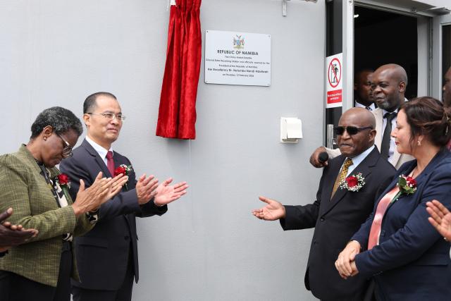 (260212) -- WINDHOEK, Feb. 12, 2026 (Xinhua) -- Namibian Prime Minister Elijah Ngurare (2nd R front) participates in the handover ceremony of the China-aided Satellite Ground Data Receiving Station with Chinese Ambassador to Namibia Zhao Weiping (2nd L) at the Telecom Earth Station outside the capital, Windhoek, Namibia, Feb. 12, 2026. TO GO WITH "Namibia receives China-aided satellite ground station to boost space capabilities" (Xinhua/Lin Jing)