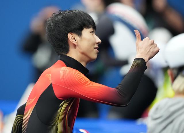 (260212) -- MILAN, Feb. 12, 2026 (Xinhua) -- Sun Long of China thumbs up after the short track speed skating men's 1000m final A at the Milan-Cortina 2026 Olympic Winter Games in Milan, Italy, Feb. 12, 2026. (Xinhua/Xue Yuge)