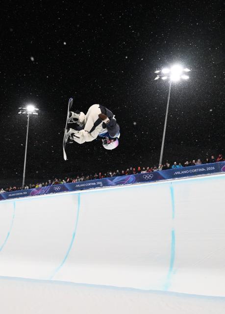 (260213) -- LIVIGNO, Feb. 13, 2026 (Xinhua) -- Kudo Rise of Japan competes during the women's snowboard halfpipe final at the Milan-Cortina 2026 Olympic Winter Games in Livigno, Italy, Feb. 12, 2026. (Xinhua/Xia Yifang)