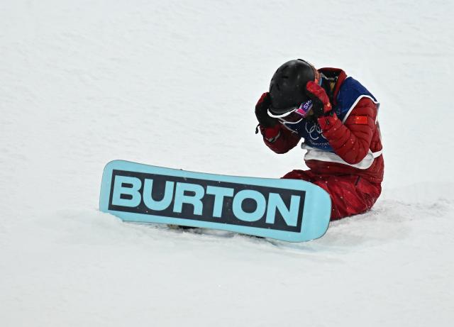 (260213) -- LIVIGNO, Feb. 13, 2026 (Xinhua) -- Cai Xuetong of China reacts after crashing during the women's snowboard halfpipe final at the Milan-Cortina 2026 Olympic Winter Games in Livigno, Italy, Feb. 12, 2026. (Xinhua/Zhang Hongxiang)
