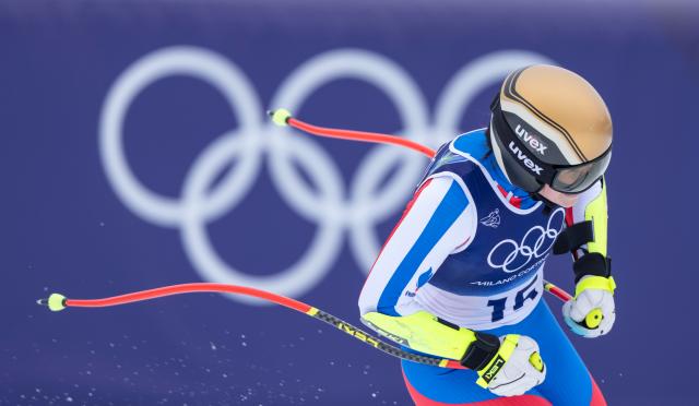 (260213) -- BEIJING, Feb. 13, 2026 (Xinhua) -- Romane Miradoli of France reacts after the alpine skiing women's Super-G at the 2026 Milan-Cortina Winter Olympics in Cortina, Italy, Feb. 12, 2026. (Xinhua/Fei Maohua)