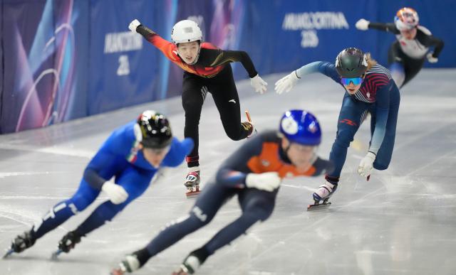(260213) -- MILAN, Feb. 13, 2026 (Xinhua) -- Wang Xinran (2nd L)of China competes during the short track speed skating women's 500m quarterfinal at the Milan-Cortina 2026 Olympic Winter Games in Milan, Italy, Feb. 12, 2026. (Xinhua/Xue Yuge)